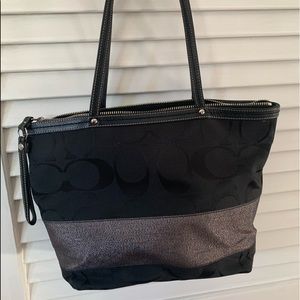 Medium size black Coach pocketbook